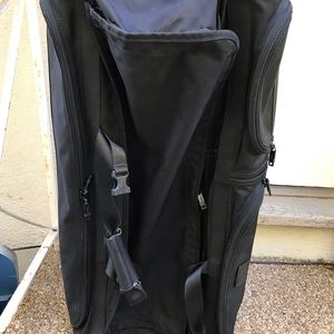 tumi duffel bag with wheels